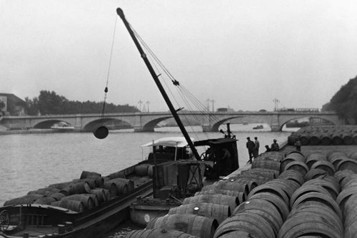 The barrels are transported - , a